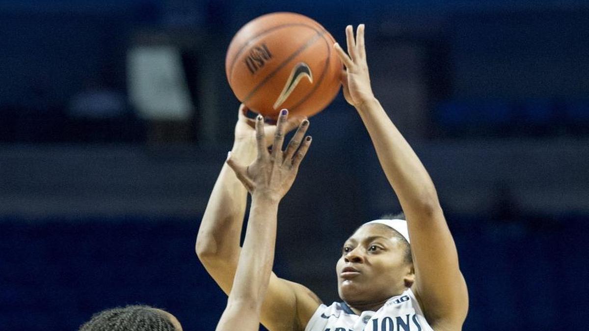 Penn State’s Teniya Page shoots for a basket over Michigan State’s Morgan Green during the teams’ matchup last month at the Bryce Jordan Center. On Thursday, she scored a game-high 20 points to lead the Lady Lions over the Spartans on the road.