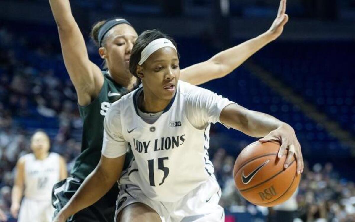 Penn State’s Kaliyah Mitchell dribbles around a Michigan State defender during the Thursday, January 7, 2016 game at the Bryce Jordan Center. Michigan State won, 71-55.