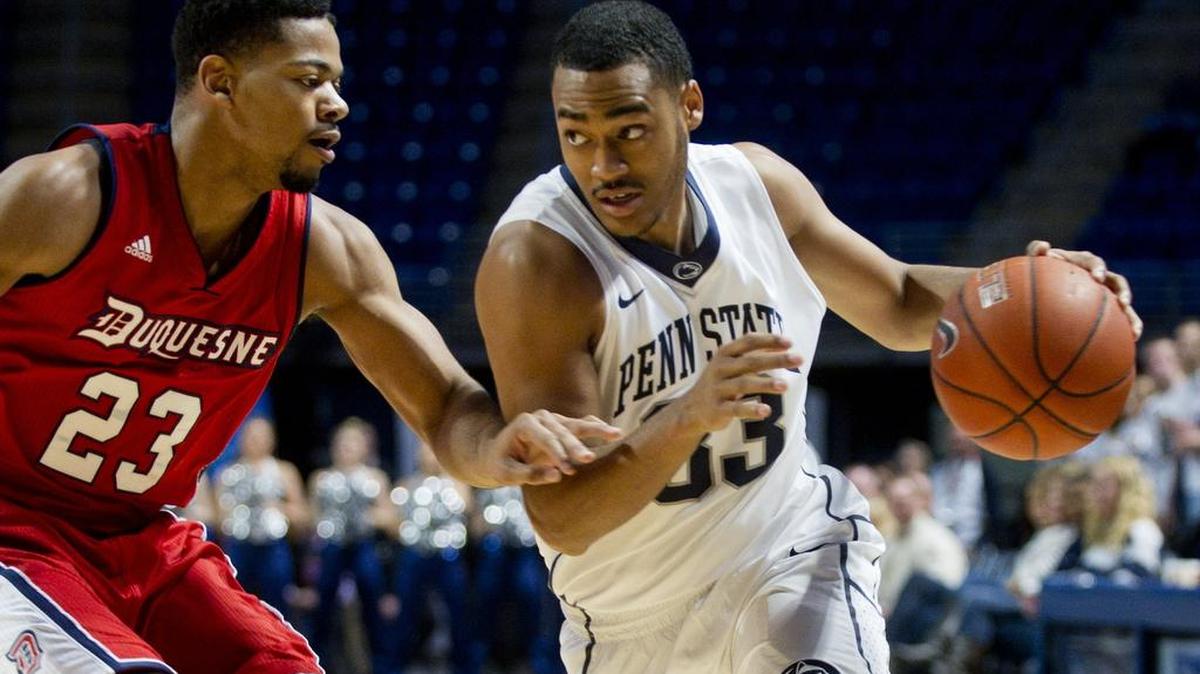 Penn State’s Shep Garner dribbles around Duquesne’s Jeremiah Jones in 2014. Penn state will hopst Duquesne this season on Nov. 13.