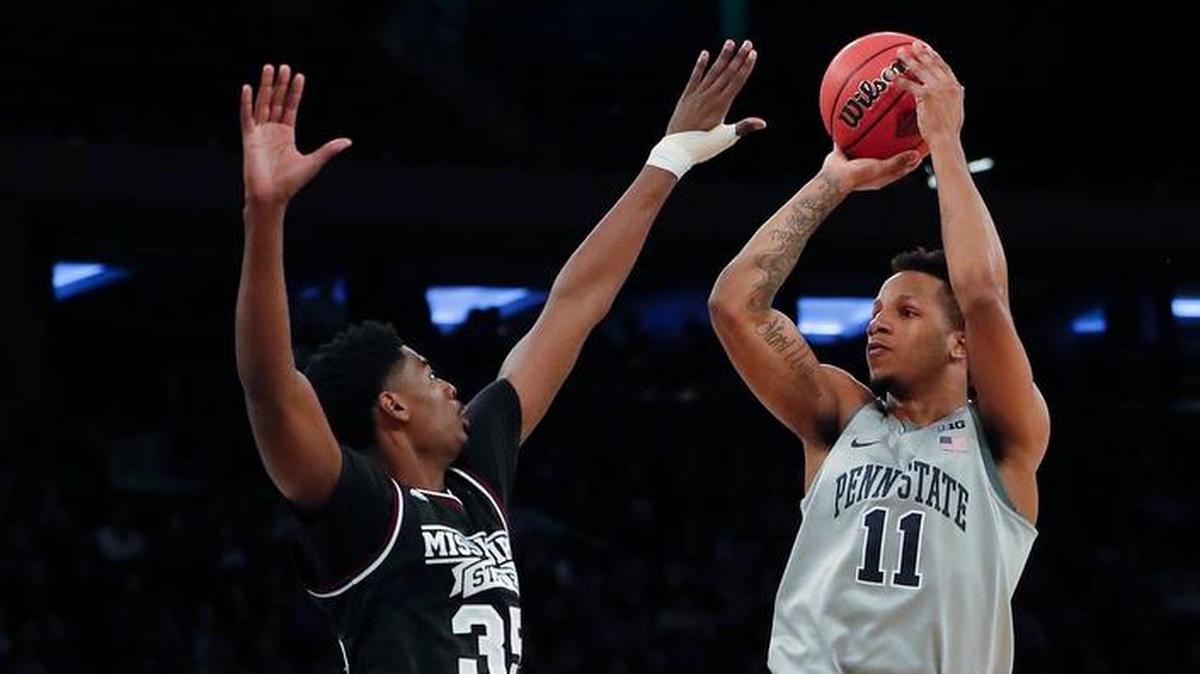 Penn State forward Lamar Stevens (11) shoots over Mississippi State forward Aric Holman (35) during the first half of an NCAA college basketball game in the semifinals of the NIT, Tuesday, March 27, 2018, in New York. (AP Photo/Julie Jacobson)