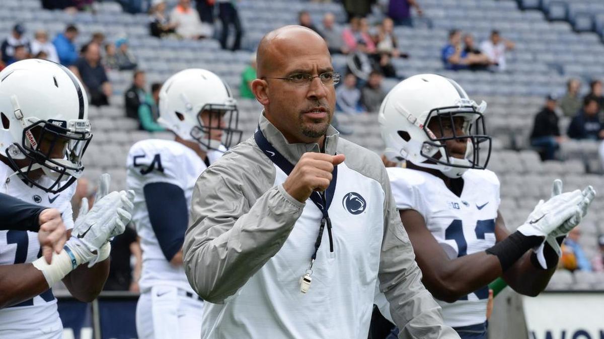 Penn State head coach James Franklin leads his team in warm-ups before the Croke Park Classic Saturday, Aug. 30, 2014 in Dublin, Ireland. 