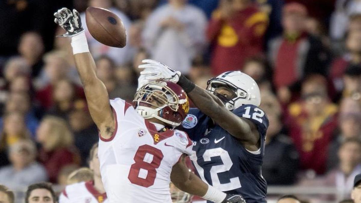 Southern Cal defensive back Iman Marshall tries to break up a catch but Penn State wide receiver Chris Godwin still grabs it and runs it in for a touchdown on Jan. 2, during the Rose Bowl.