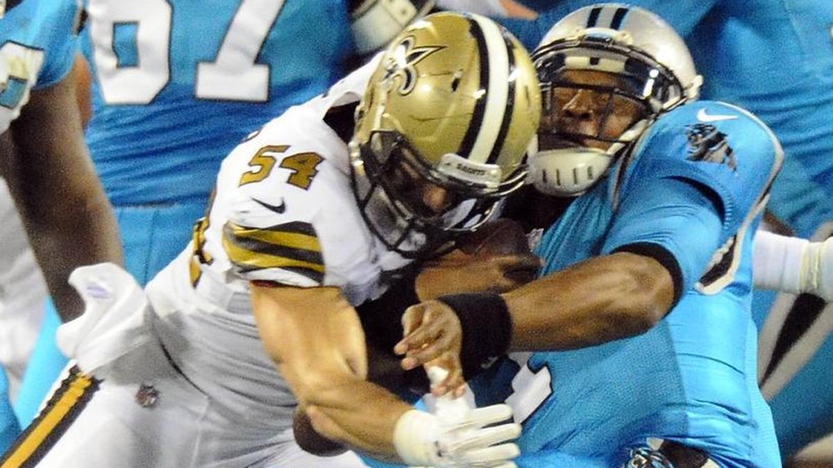 New Orleans Saints linebacker Nate Stupar (54) sacks Carolina Panthers quarterback Cam Newton during last season’s meeting. Stupar is from State College, played at Penn State — and told his friends asking for tickets to this week’s Michigan game, ‘Good luck.’