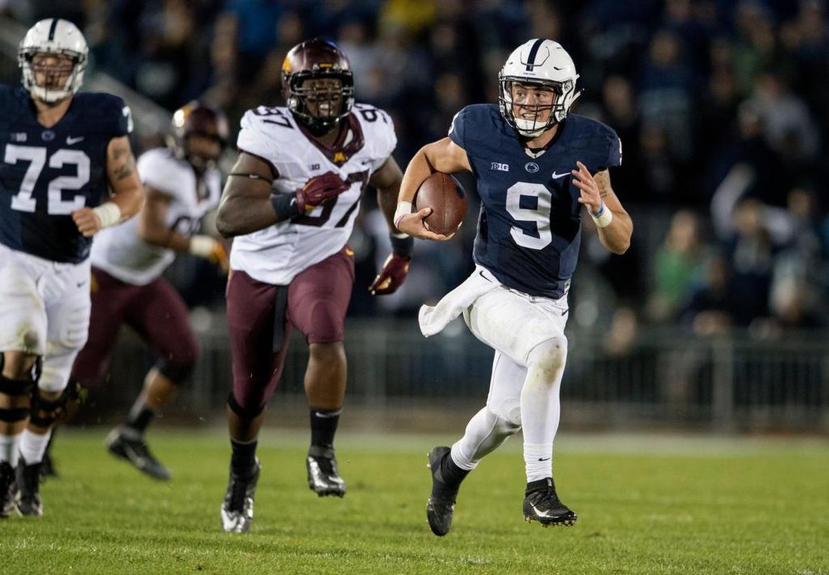 Penn State quarterback Trace McSorley runs down the field for a first down late in the Nittany Lions’ 29-26 overtime victory over Minnesota on Saturday. With the win, Penn State brought the