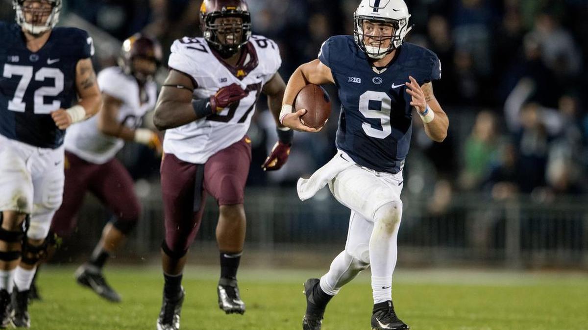 Penn State quarterback Trace McSorley runs down the field for a first down late in the Nittany Lions’ 29-26 overtime victory over Minnesota on Saturday. With the win, Penn State brought the