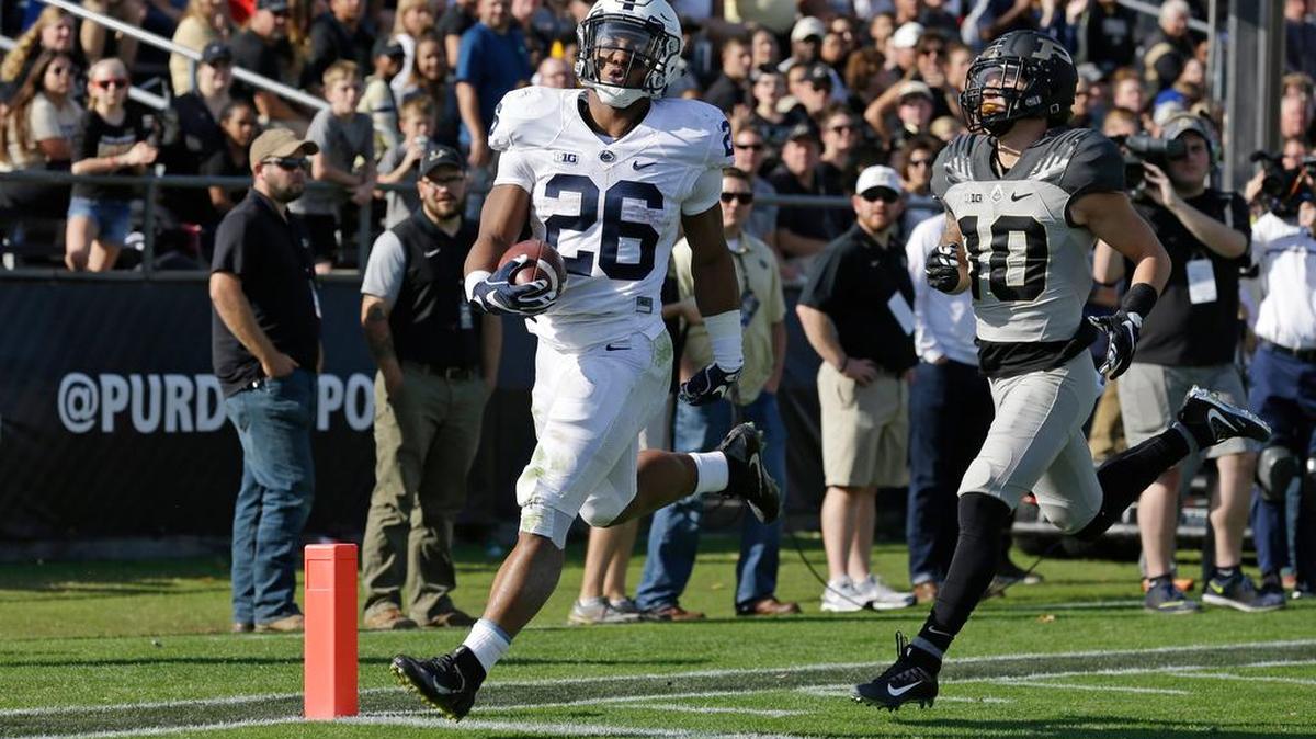 Penn State running back Saquon Barkley (26) scores on a 81-yard run against Purdue during the second half of an NCAA college football game in West Lafayette, Ind., Saturday, Oct. 29, 2016. Penn State defeated Purdue 62-24. (AP Photo/Michael Conroy)