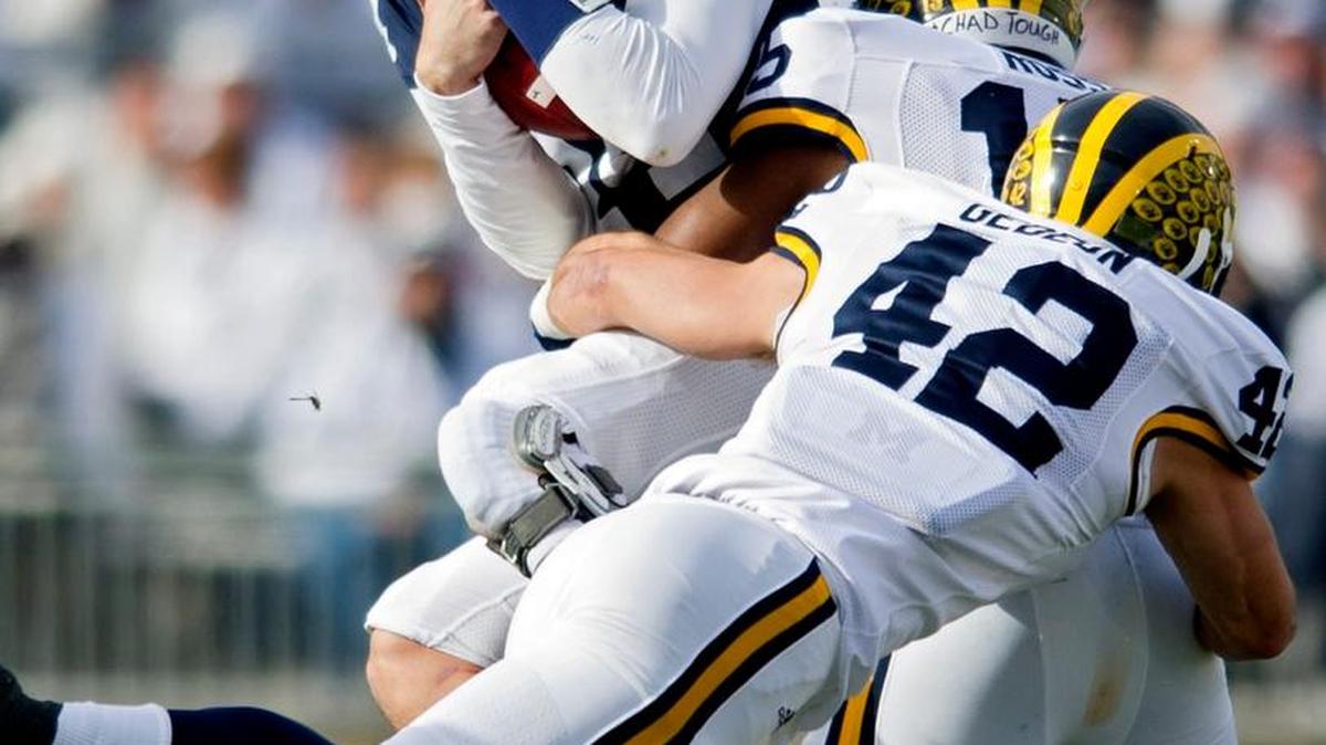 Michigan linebacker James Ross sack Penn State quarterback Christian Hackenberg during the Saturday, November 21, 2015 football game at Beaver Stadium. Michigan won, 28-16.