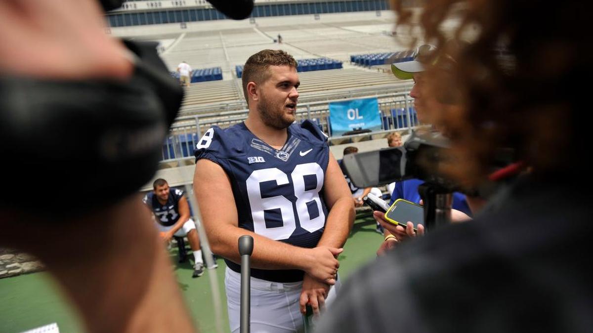 Offensive lineman Kevin Reihner talks to reporters during media day. The Penn State University football team hosted media day at Beaver Stadium Thursday, August 6, 2015 in University Park, Pa.