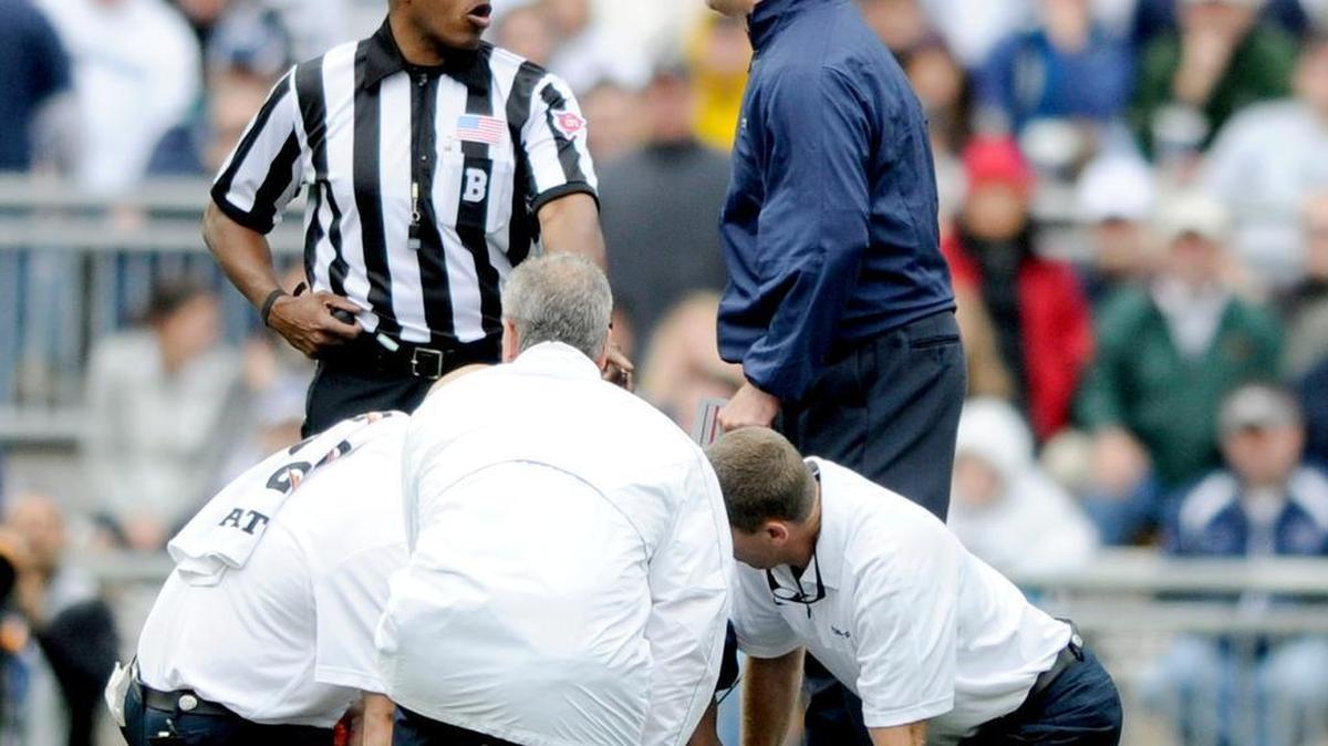 Two former Penn State football players have elected to remove their names from a concussion-related class-action lawsuit against the university, the NCAA and the Big Ten.