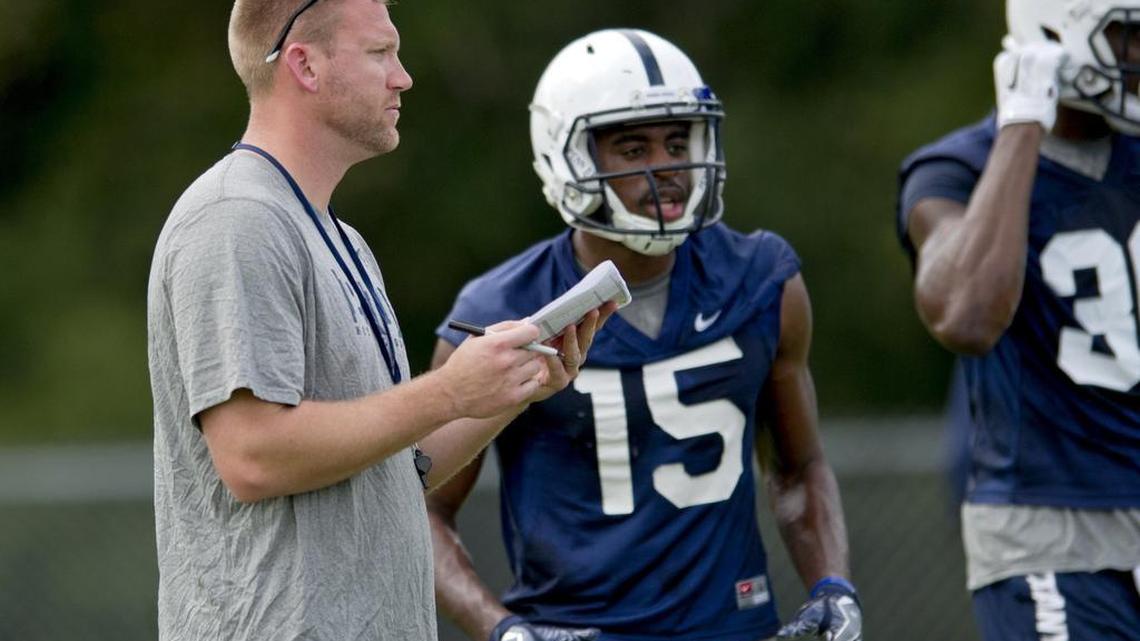Penn State's temporary offensive coordinator and quarterbacks coach Ricky Rahne watches the team during practice on Thursday, December 31, 2015 at Fernandina Beach High School in preparation for the TaxSlayer Bowl.
