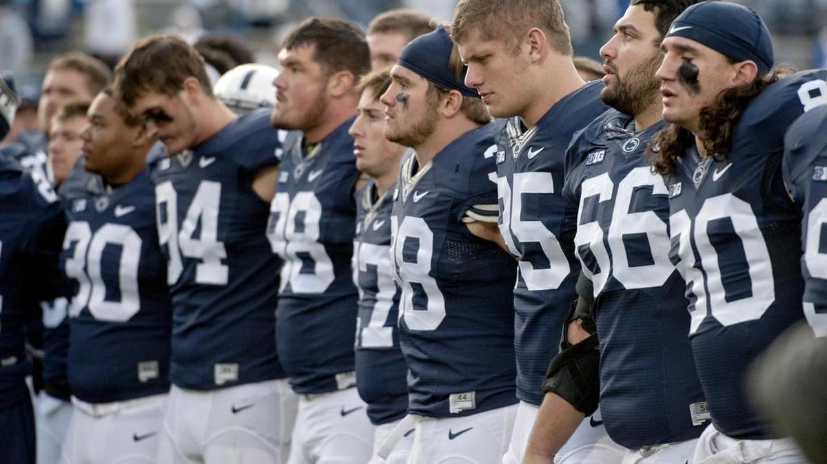 Penn State defensive end Carl Nassib stands in disappointment with his teammates after the 28-16 loss to Michigan at Beaver Stadium on Saturday, November 21, 2015.