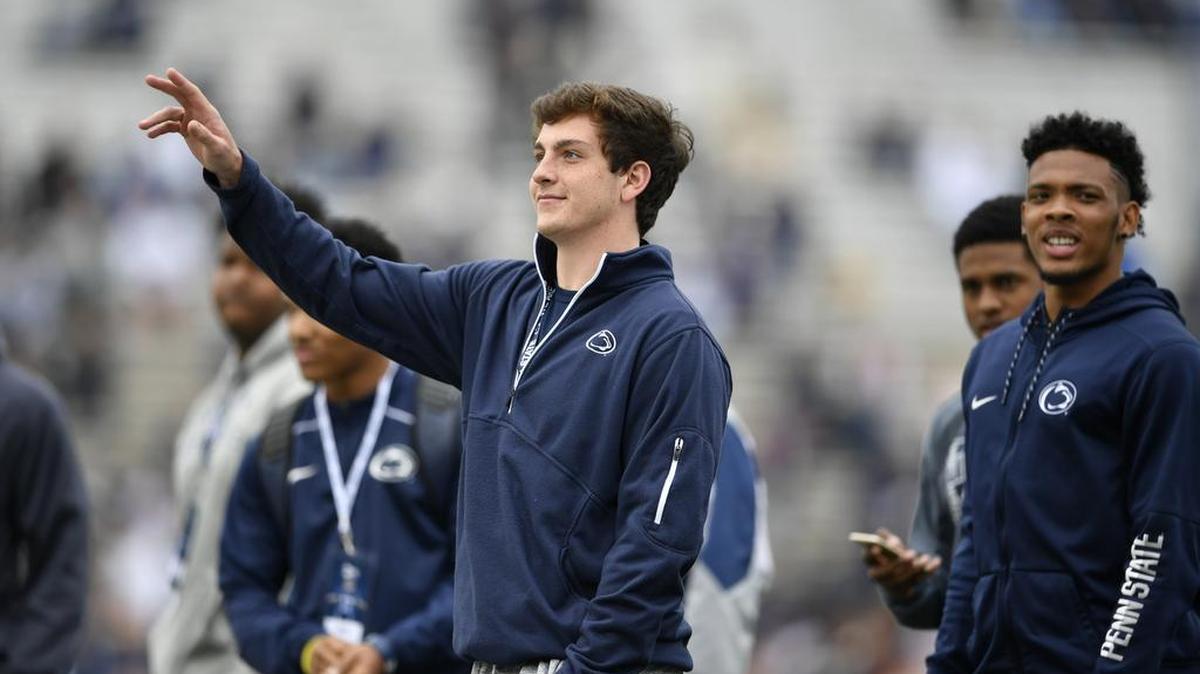 Incoming Penn State freshman quarterback Sean Clifford waves to fans at the Blue-White Game on April 22 at Beaver Stadium. Clifford was ranked as the nation’s 80th-best high school prospect — and third-best pocket passer — according to ESPN.