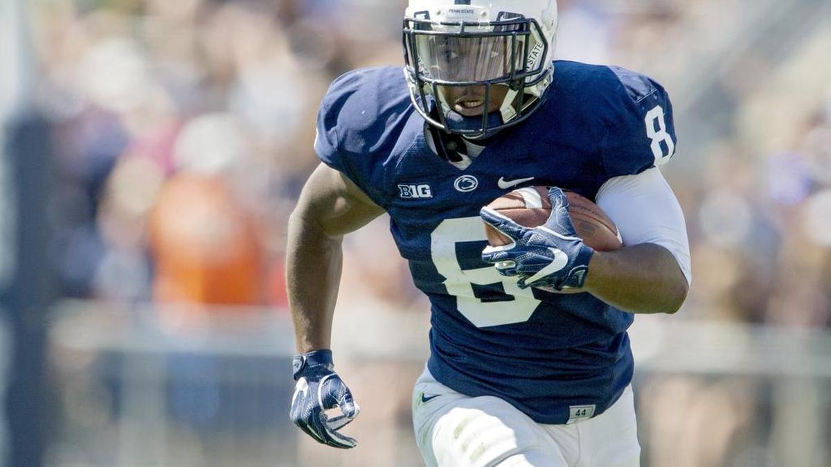 Penn State running back Mark Allen darts down the field with the ball during the Blue-White game on Saturday, April 16, 2016 at Beaver Stadium.
