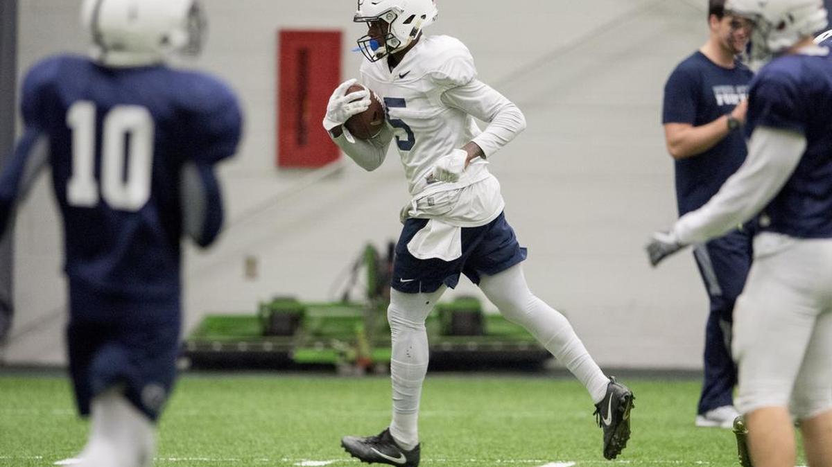 Penn State wide receiver DaeSean Hamilton runs with the ball after making a catch at practice on Wednesday, November 16, 2016 in Holuba Hall.