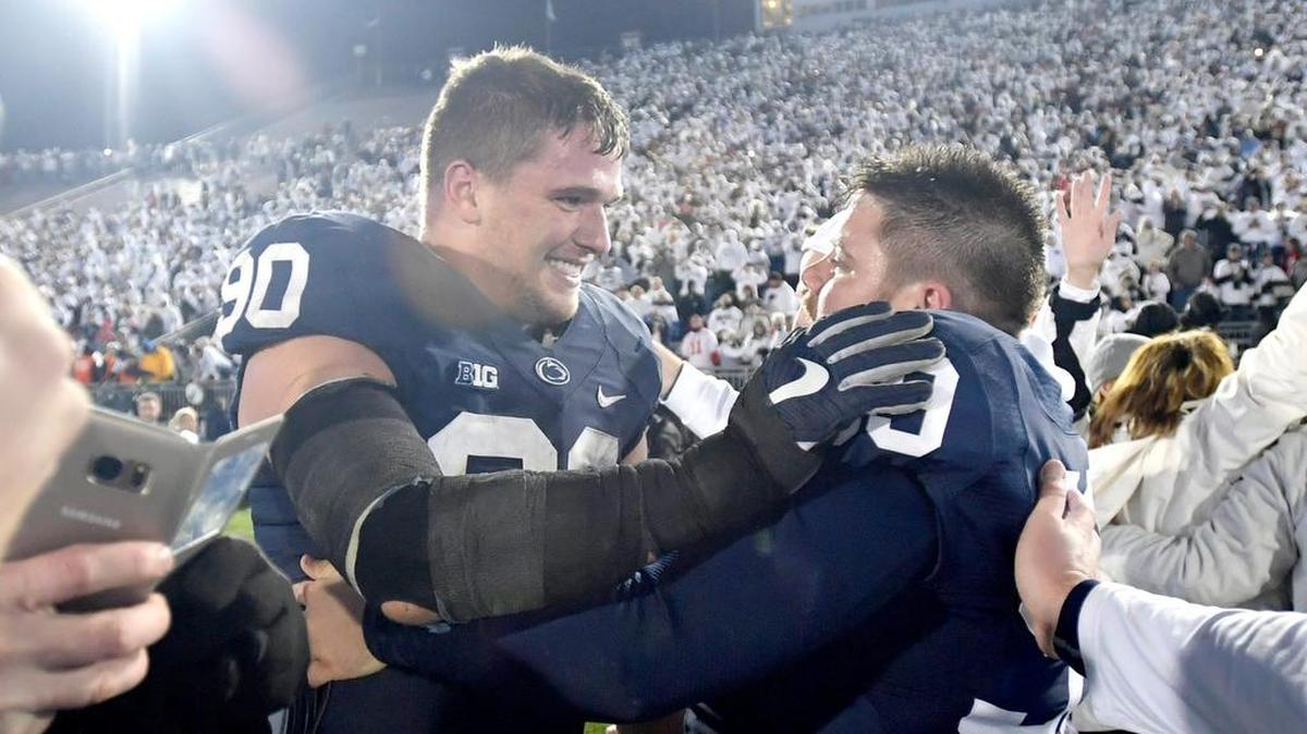 Penn State defensive end Garrett Sickels and kicker Joey Julius celebrate the 24-21 win over Ohio State on Saturday, October 22, 2016 in Beaver Stadium.