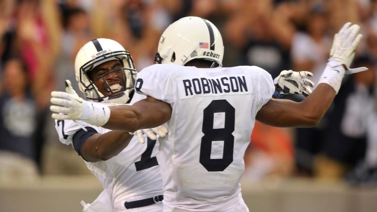 Eugene Lewis celebrates with Allen Robinson after scoring a touchdown. Penn State beat Syracuse 23-17 Saturday, August 31, 2013, at MetLife stadium, in East Rutherford, NJ. Robinson went on to set single-season receiving records that year with 1,432 yards on 97 catches.