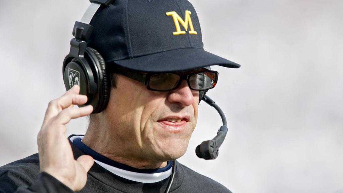 An animated Michigan coach Jim Harbaugh fired off at the officials in Saturday’s 28-16 win over the Nittany Lions. He fired up his team — and the fans — in doing so.