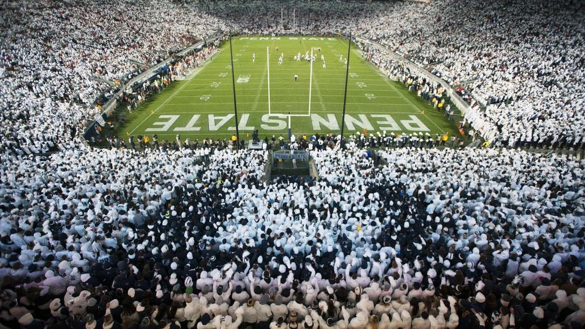 Penn State students cheer on the team during the White Out game Oct 22 at Beaver Stadium.