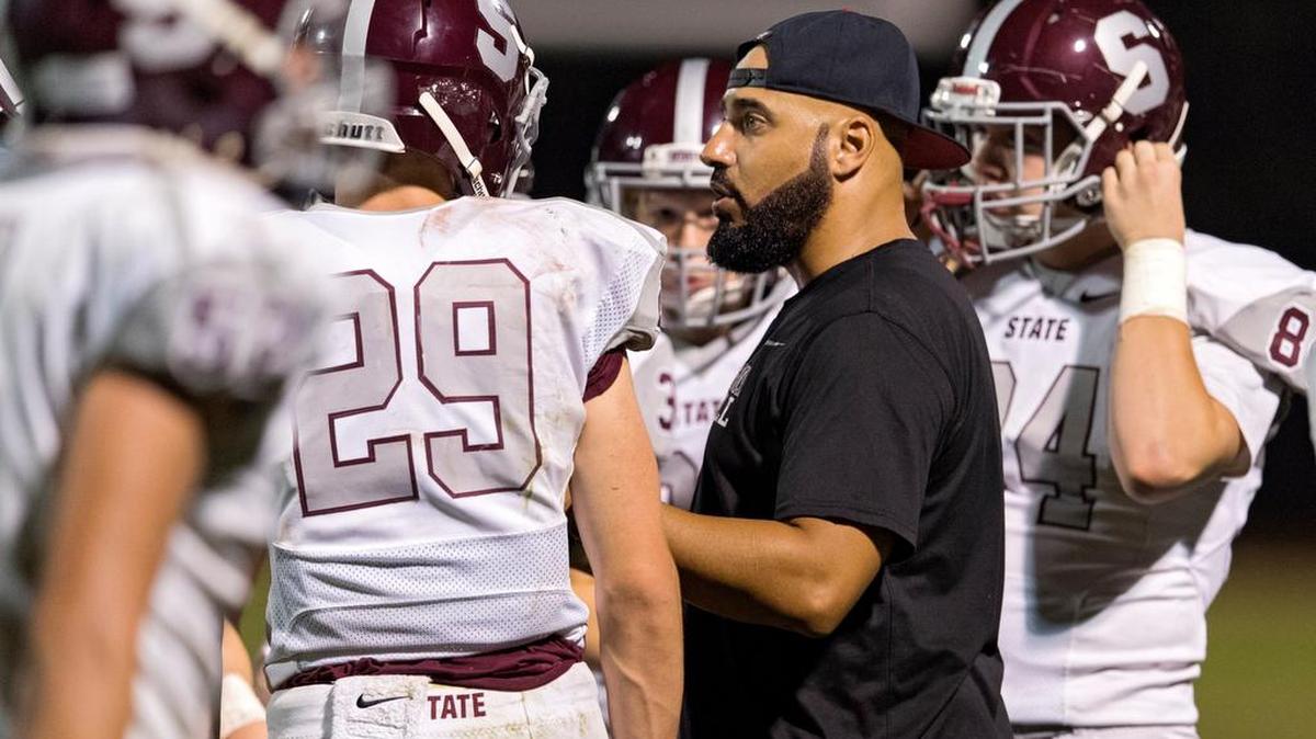 State College football assistant coach Joe Nastasi, a former wide receiver at Penn State, talks to his players during a game against Cumberland Valley on Oct. 6.