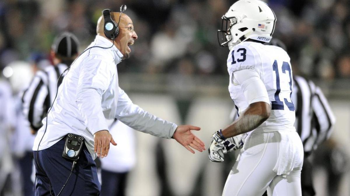 Penn State coach James Franklin greets Saeed Blacknall during the matchup against Michigan State.