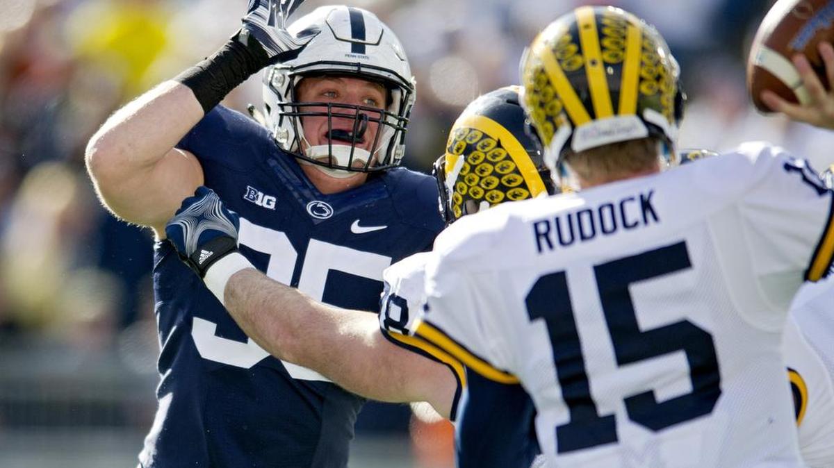 Penn State defensive end Carl Nassib tries to block a pass from Michigan linebacker James Ross during the Saturday, November 21, 2015 football game at Beaver Stadium. Michigan won, 28-16.