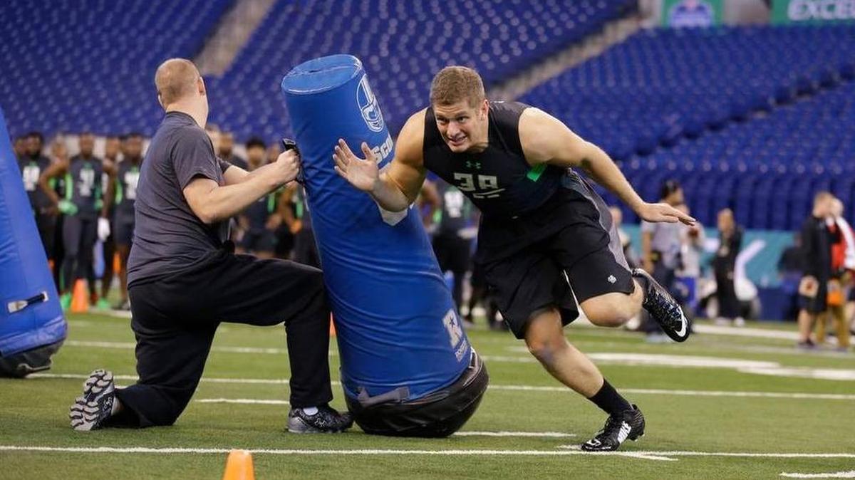 Penn State defensive lineman Carl Nassib runs a drill at the NFL combine in Indianapolis on Sunday. Michael Conroy AP