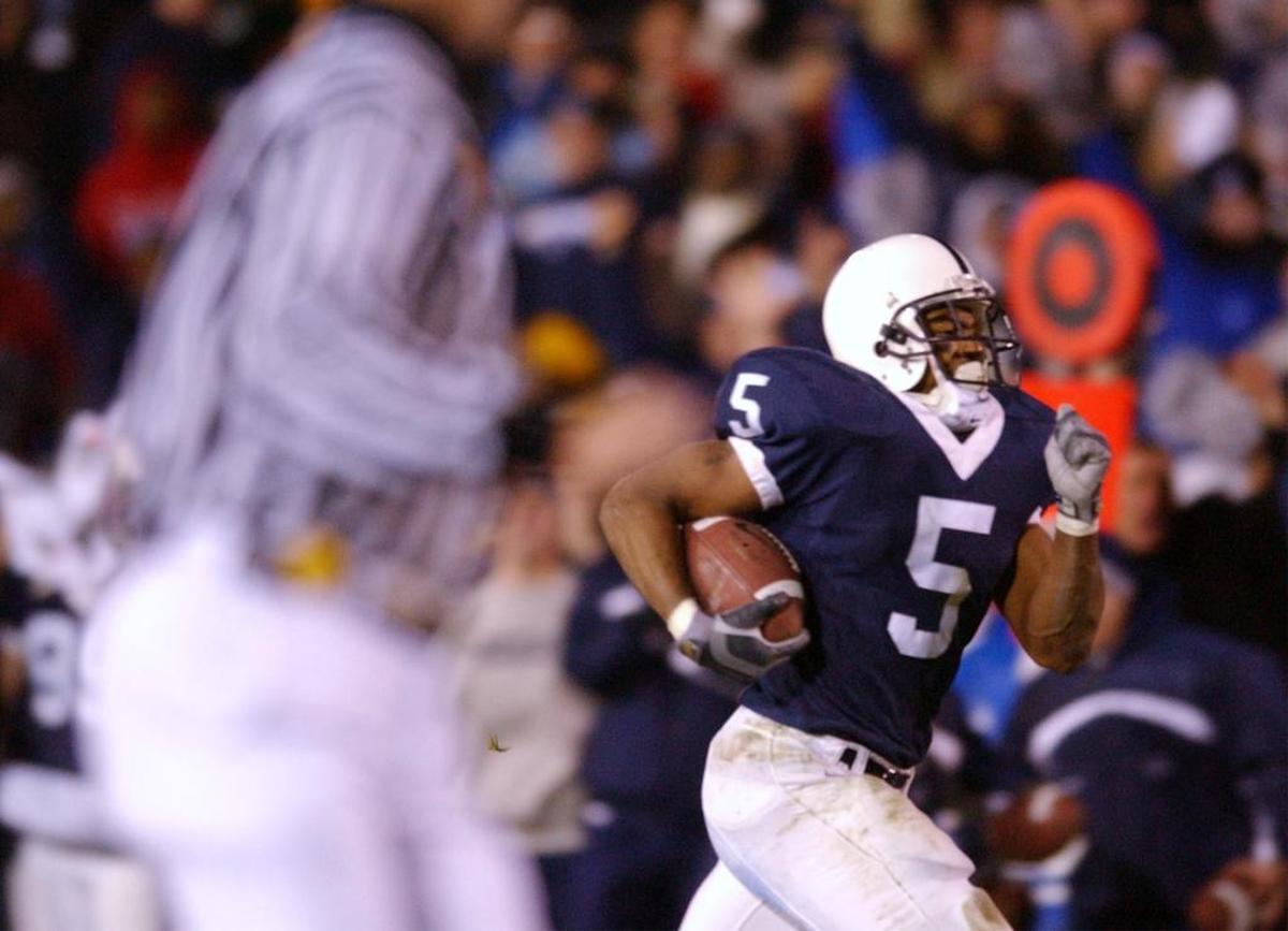Penn State’s Larry Johnson heads to the end zone for a 38-yard touchdown run against Michigan State on Saturday, Nov. 23, 2002. 