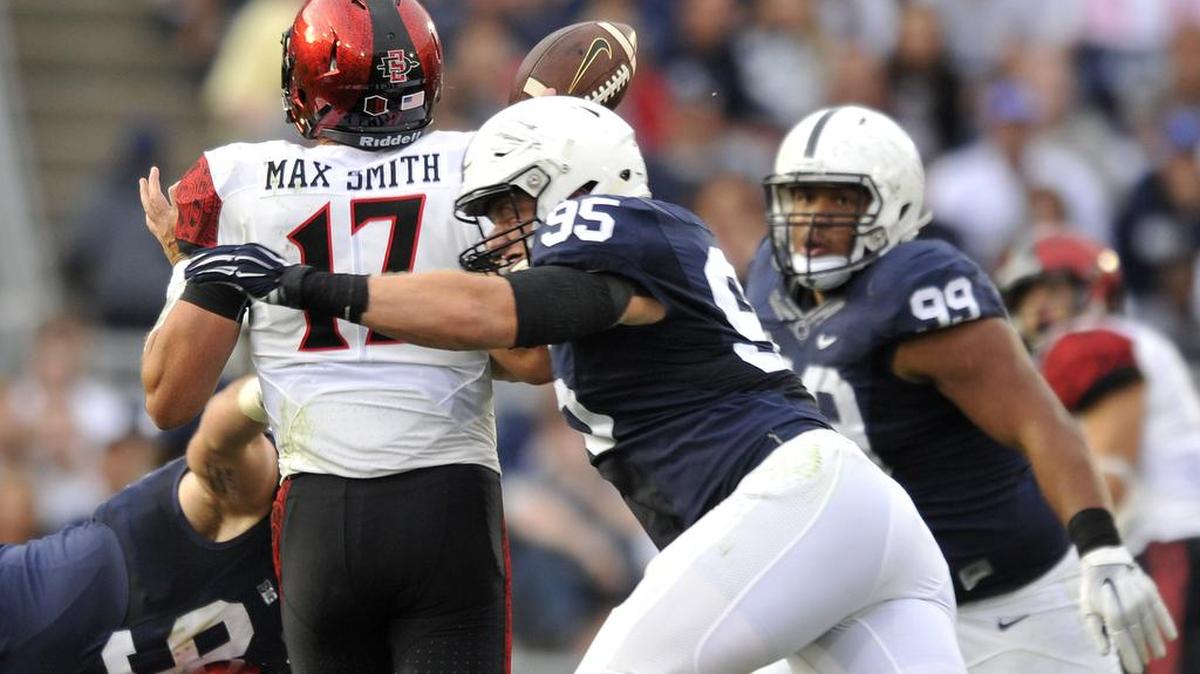 Carl Nassib hits Maxwell Smith forcing him to fumble, which led to Austin Johnson picking up the fumble and scoring a touchdown. Penn State beat San Diego State 37-21 on Sept. 26, 2015 in University Park, Pa.