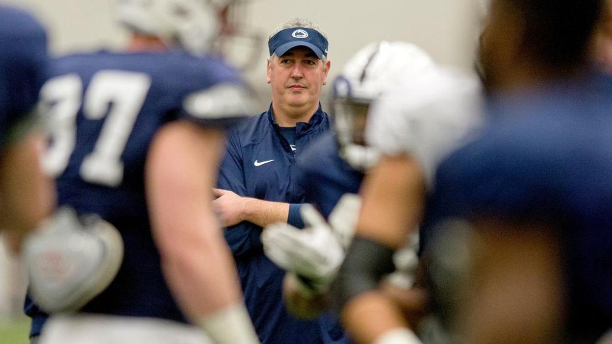 New offensive coordinator Joe Moorhead watches the players during practice on Friday, December 18, 2015 at Holuba Hall.
