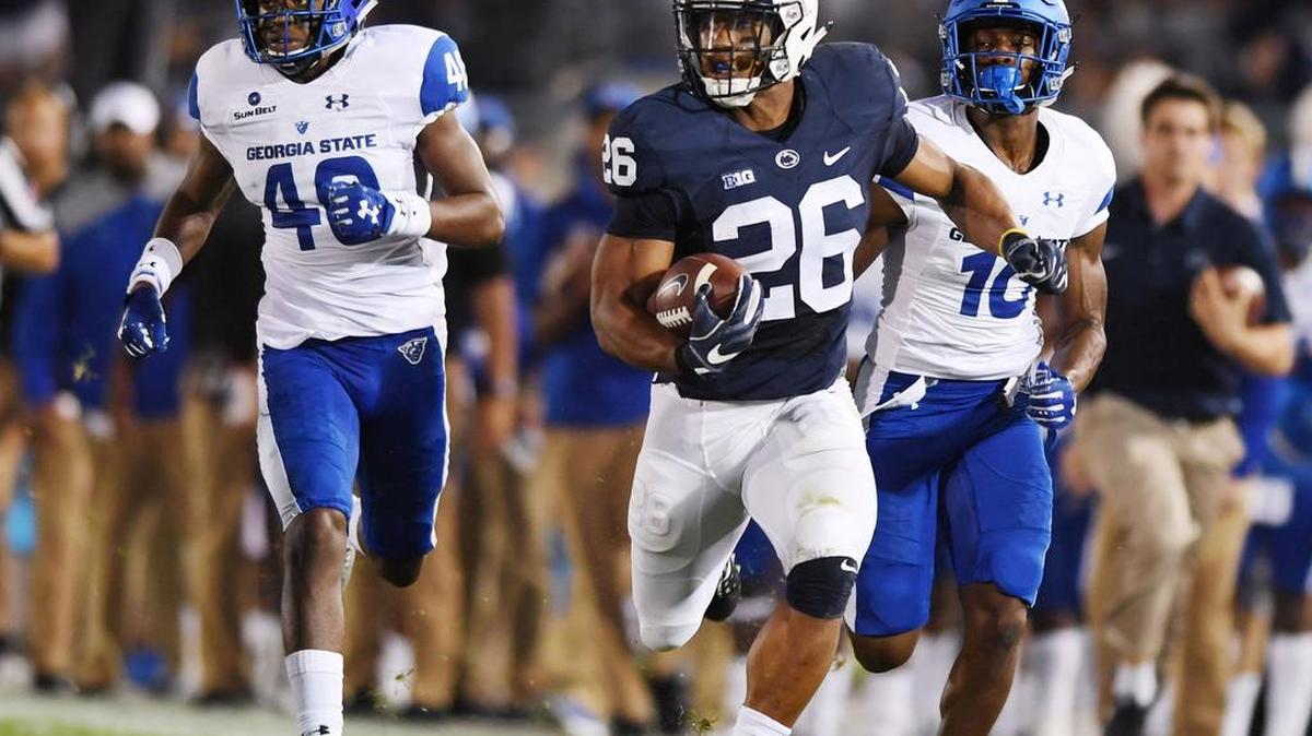 Penn State running back Saquon Barkley runs the ball down the field to score an 85-yard touchdown during Saturday night’s game against Georgia State at Beaver Stadium.
