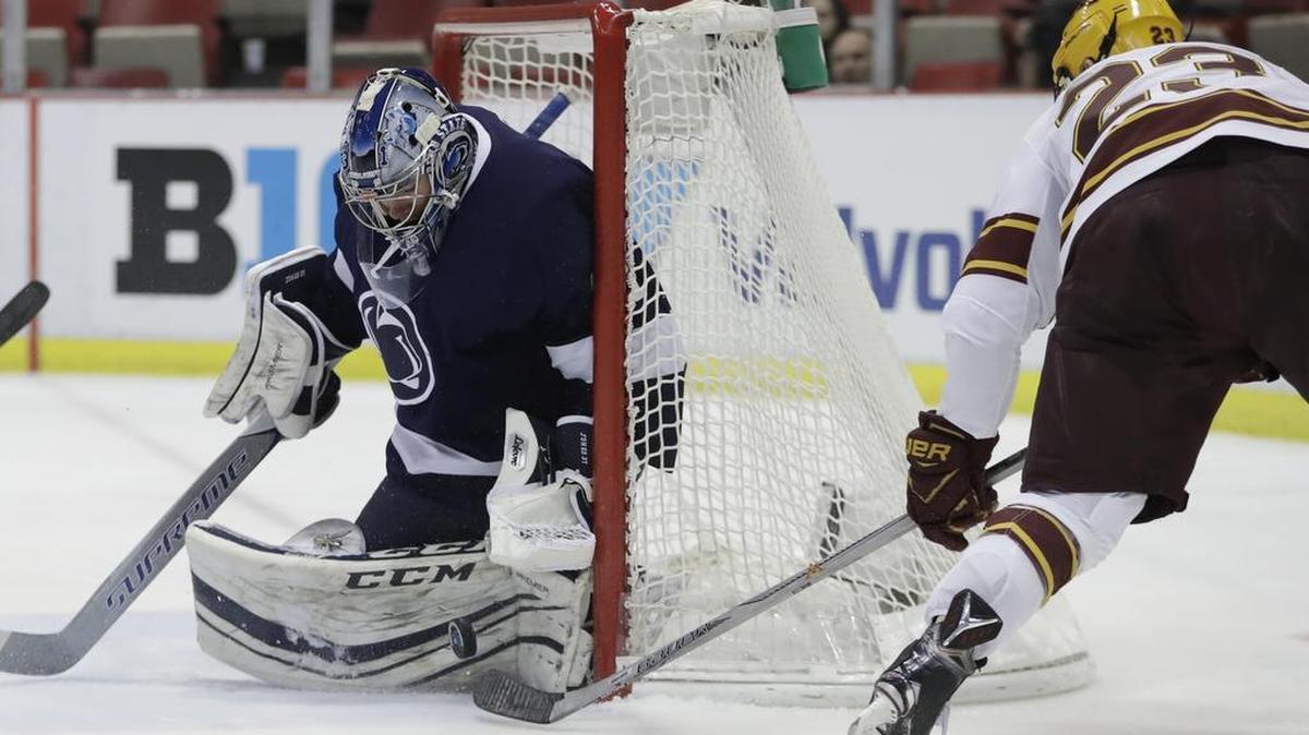 Penn State goalie Peyton Jones stops a shot by Minnesota forward Ryan Norman (23) during the Big Ten Tournament semifinals.