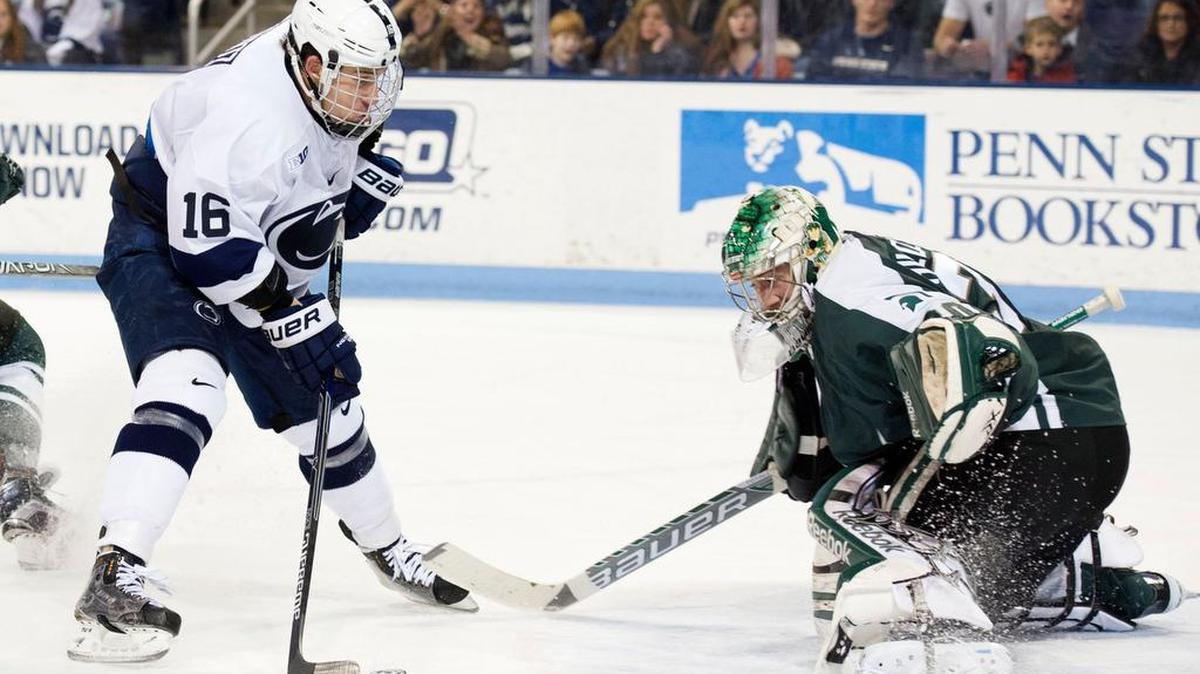 Penn State’s Andrew Sturtz (16) scored the game-winning goal to beat 3-2 in overtime over No. 3 Notre Dame on Saturday.