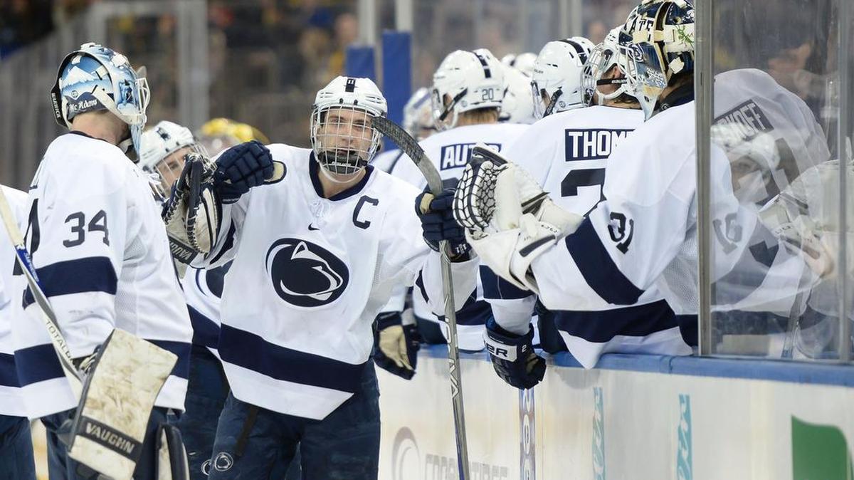 Penn State’s David Glen and his teammates celebrate an early goal to tie the game Saturday against Michigan at Madison Square Garden in New York City. Michigan defeated Penn State, 6-3.
