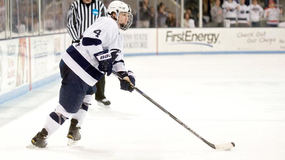 Penn State's Luke Juha shoots the winning goal in overtime of the Saturday, February 21, 2015 game against Minnesota in Pegula Ice Arena.