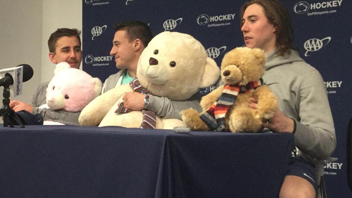 Penn State hockey players, from left, David Goodwin, Andrew Sturtz and David Thompson are joined by some furry friends while talking with the media Monday. The team will hold its annual “Teddy Bear Toss” during Friday’s game against Michigan to benefit Thon.