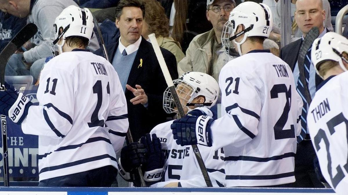 Penn State men's hockey coach Guy Gadowsky talks to his players during the Saturday, January 24, 2015 game against Northern Michigan at Pegula Ice Arena.