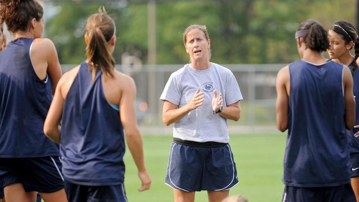 Penn State women's soccer head coach Erica Walsh encourages one of her players during a drill at practice on Friday, August 5, 2011. CDT/Abby Drey