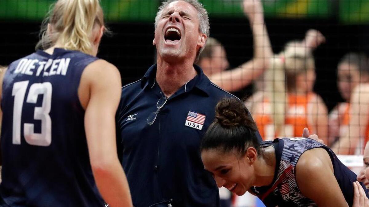 U.S. women’s volleyball team head coach Karch Kiraly, center, lets out a yell as he celebrates with former Penn State All-Americans Christa Dietzen, left, and Alisha Glass after defeating the Netherlands for the bronze medal at the Olympics in Rio de Janeiro on Saturday.