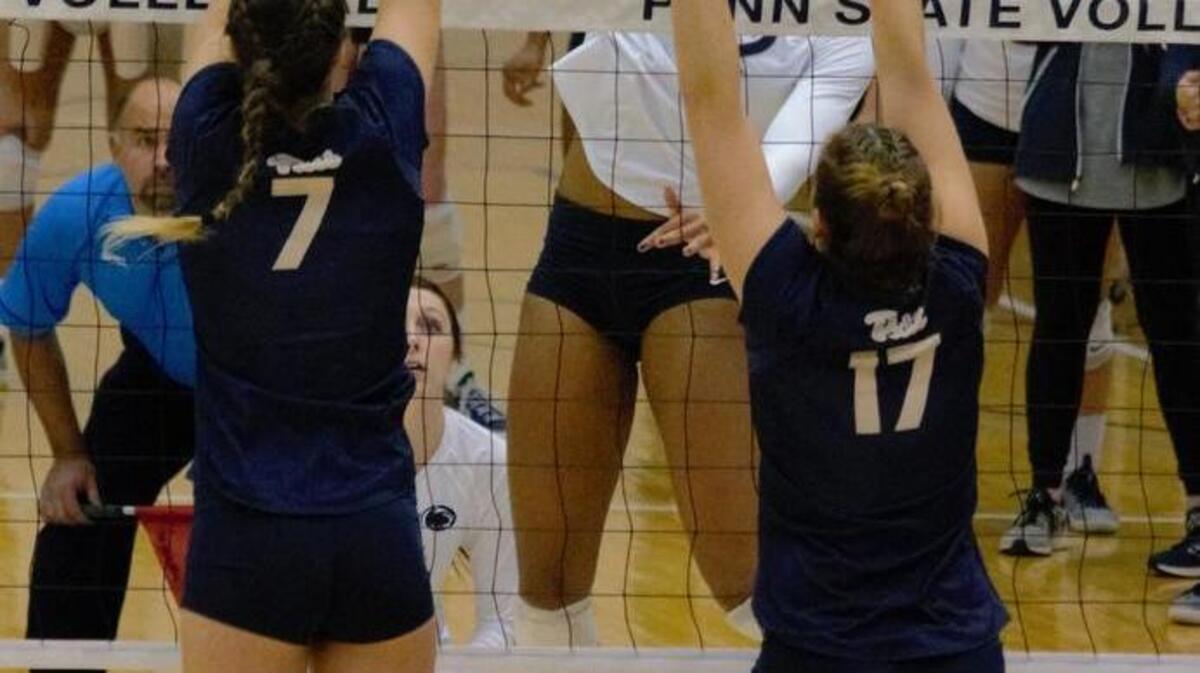 Penn State’s Simone Lee spikes the ball over Pittsburgh’s Layne Van Buskirk (7) and Nika Markovic (17) during the Nittany Lions’ 3-1 NCAA second-round win Saturday at Rec Hall.