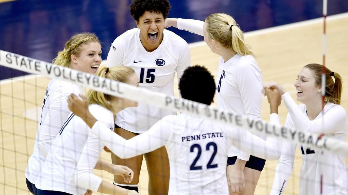 Penn State’s Haleigh Washington and her teammates celebrate a point during the Nov. 4 game in Rec Hall.