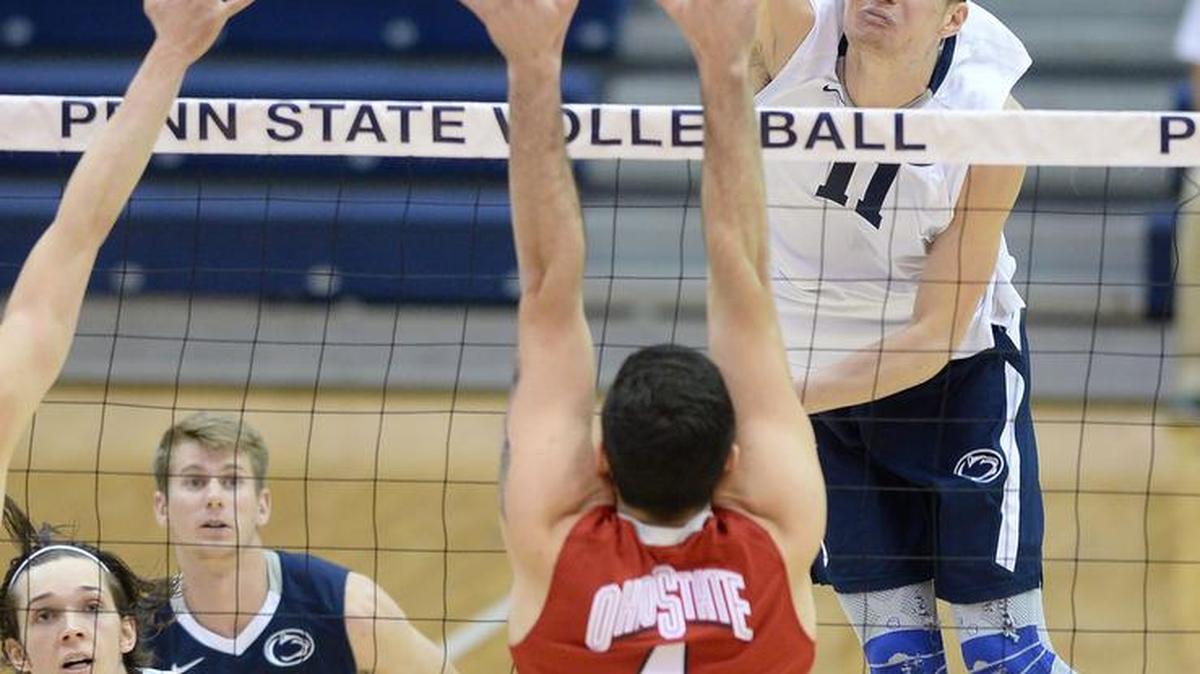 Penn State’s Chris Nugent (11) scores one of more than 15 kills over Ohio State’s Driss Guessous (4) Saturday night at Recreation Hall. Ohio State defeated Penn State, 3-2. (For the CDT/Steve Manuel)