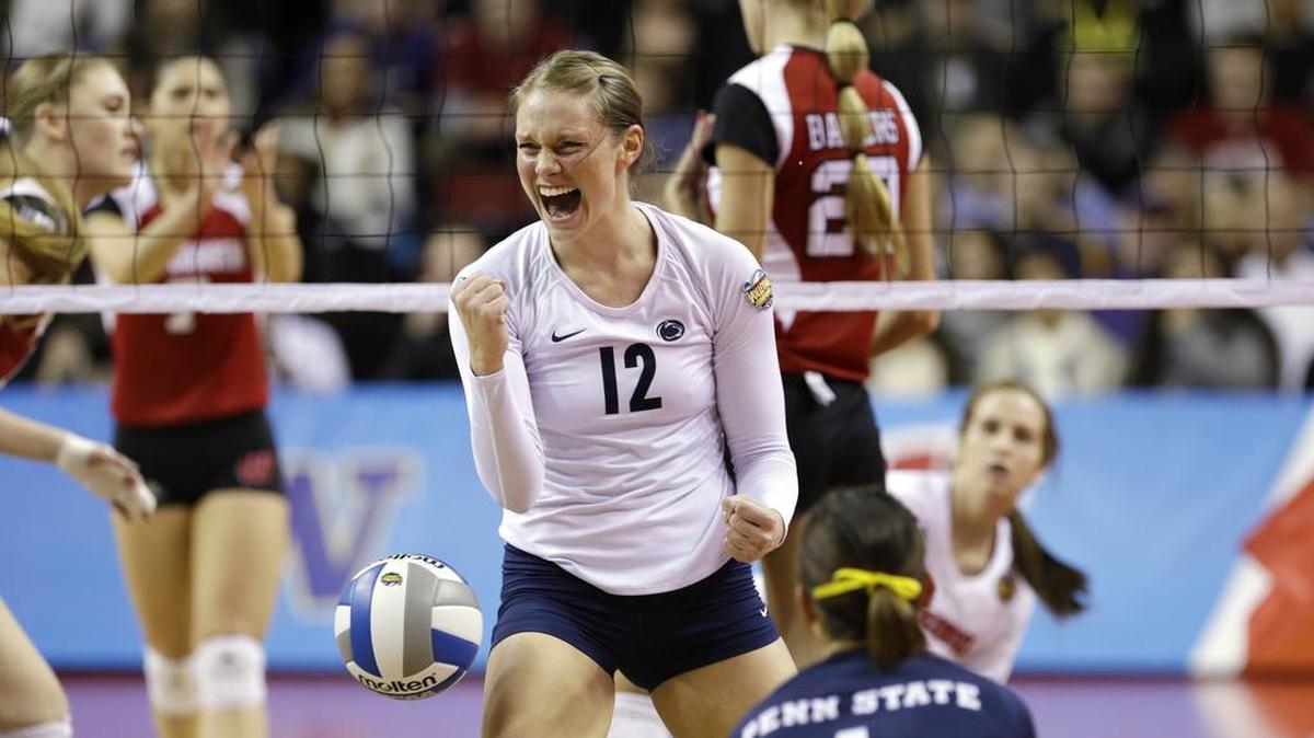 Penn State’s Micha Hancock (12) reacts after she blocked a shot by Wisconsin in an NCAA women’s volleyball tournament championship final in 2013. Hancock and former outside hitter Megan Courtney have been selected to the U.S. women’s national team roster for the Pan Am Cup.