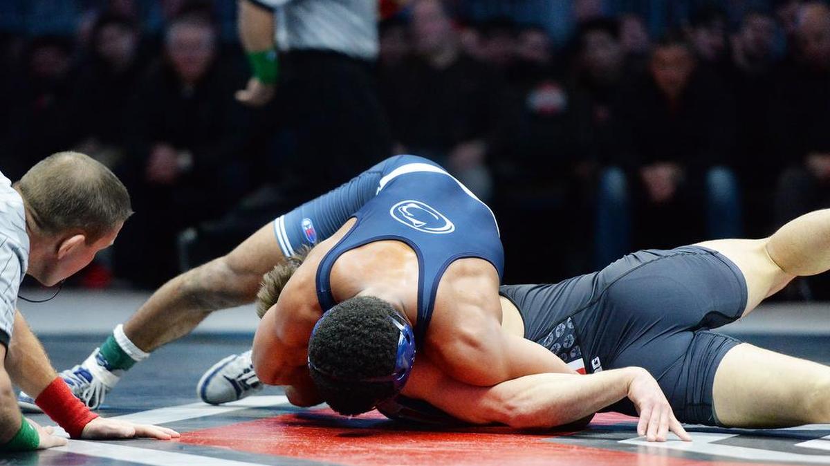 Penn State’s Mark Hall pins Ohio State’s Justin Kresevic at 174 pounds during Friday night’s match against the No. 4 Ohio State Buckeyes in Columbus, Ohio. Penn State defeated Ohio State 32-12.