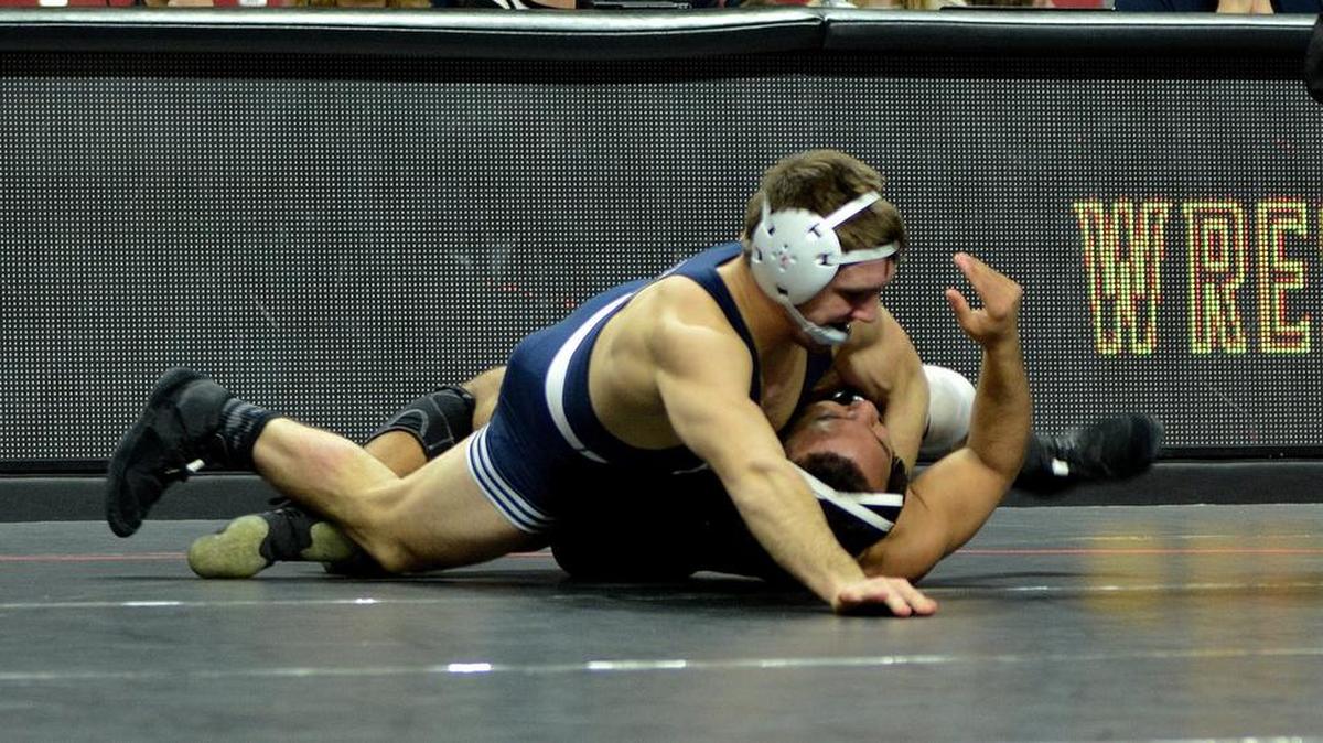 Penn State’s Zain Retherford pins Maryland’s Alfred Bannister in their 149-pound bout during the Nittany Lions’ 47-3 win on Sunday afternoon. It was Retherford’s 51st career fall and he is two away from the all-time mark.
