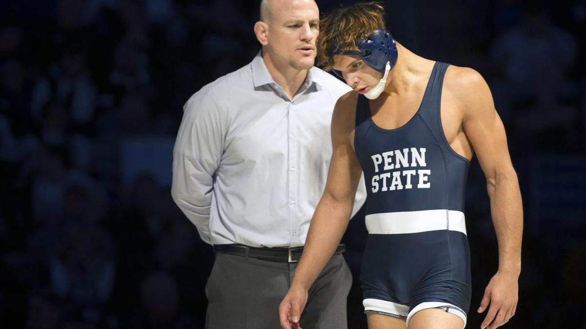 Penn State coach Cael Sanderson, left, has a decision again this season on whether to start Shakur Rasheed or Geno Morelli exactly like last year.