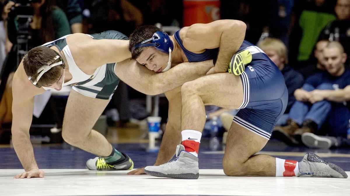 Penn State’s Morgan McIntosh pulls in Michigan State’s Jacob Cooper in their 197-pound bout during the Nittany Lions’ 41-3 win on Saturday. McIntosh won by fall in 4:22.