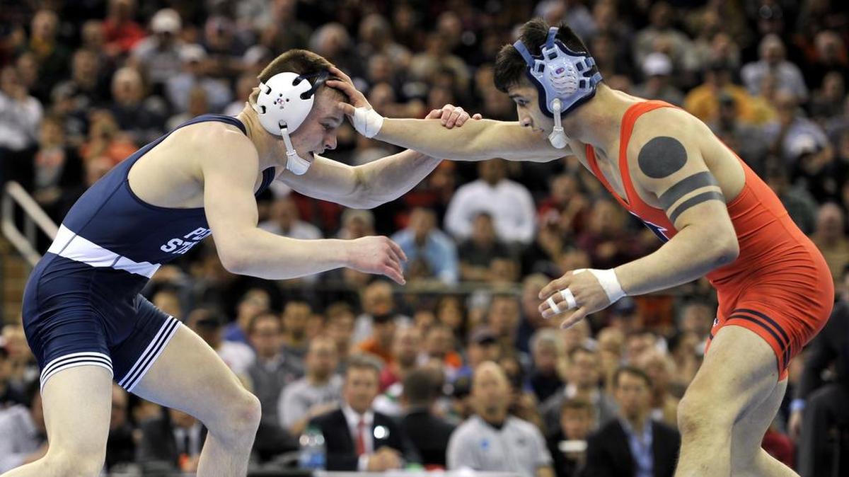 Penn State’s Jason Nolf, left, is one of four Nittany Lion wrestlers who will have a matchup with another ranked wrestler on Friday against Rutgers. Nolf will face No. 16 John Van Brill, who has three wins over top-10 opponents.