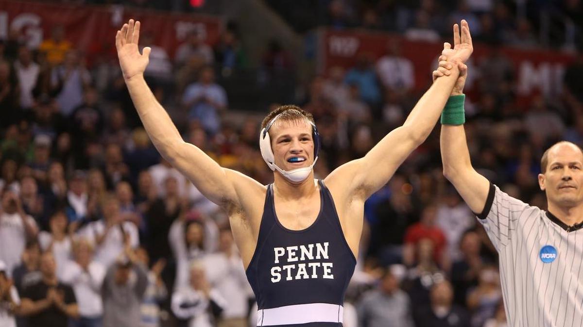 Penn State 165-pounder David Taylor has his hand raised after defeating Tyler Caldwell of Oklahoma State 6-0 to win the national title at the NCAA 2014 Division I Wrestling Championships in the Chesapeake Energy Arena in Oklahoma City, Okla. Taylor on Sunday became the 12th U.S. man ever to win gold at the Ivan Yarygin Grand Prix in Krasnoyarsk, Russia.