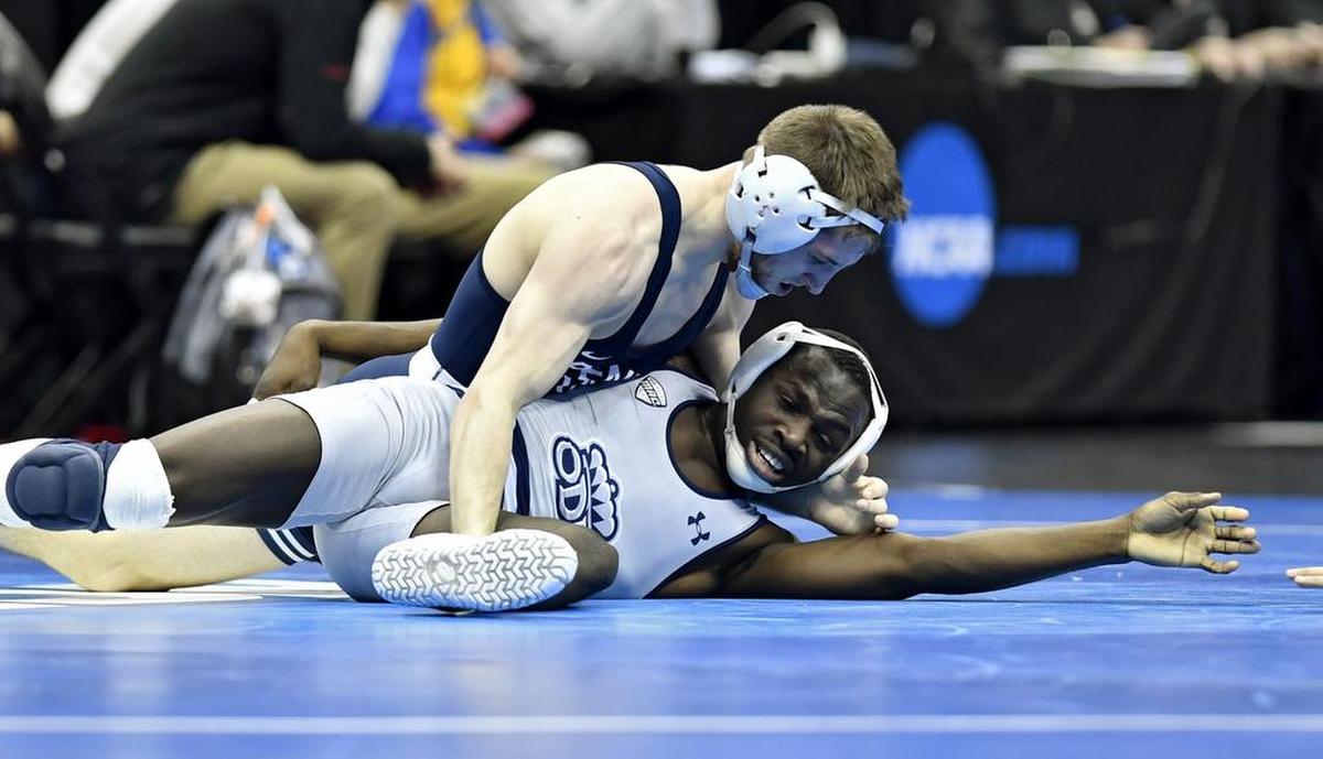 Penn State’s Nick Lee controls Old Dominion’s Sa’Derian Perry in the 141 lb bout during the sweet sixteen round of the NCAA Division 1 Wrestling championships on Thursday, March 21, 2019 at PPG Paints Arena. Lee won by fall at 3:43.