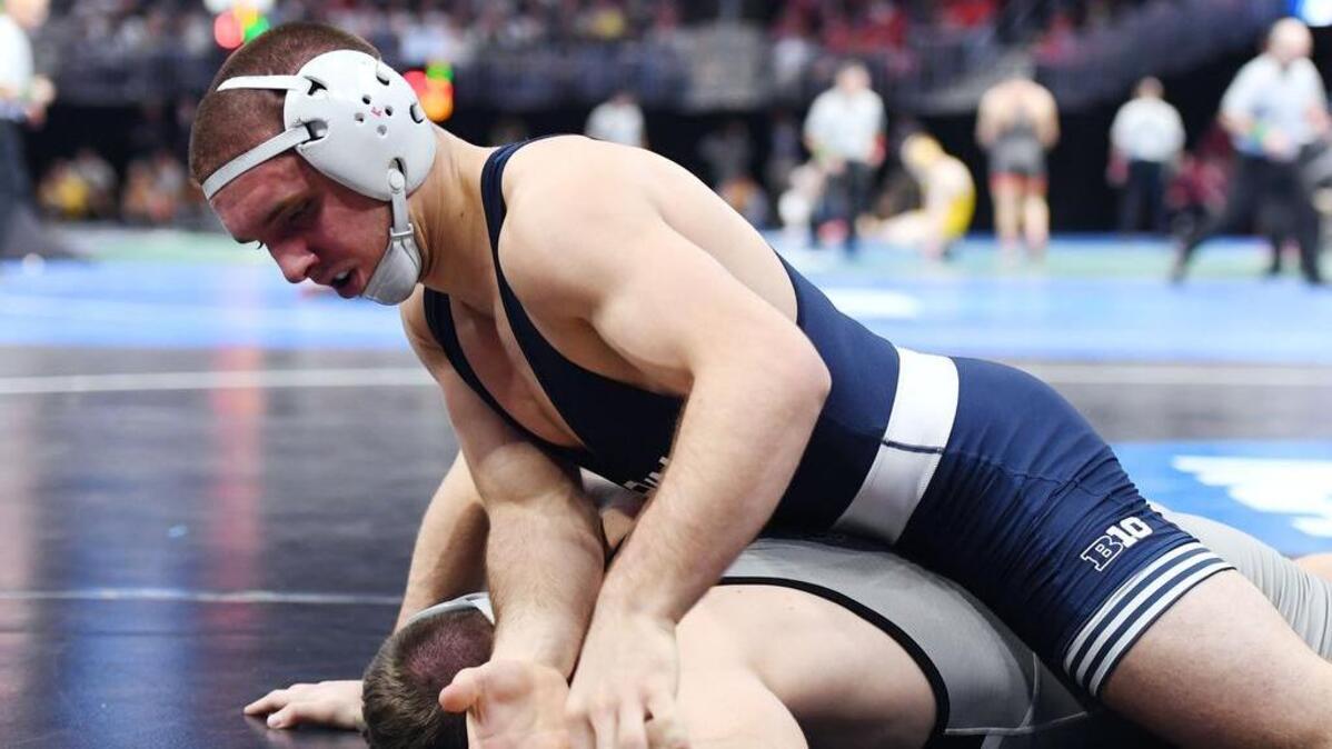 Penn State’s Zain Retheford controls Eastern Michigan’s Kyle Springer in their 149-pound first round match during the NCAA Division I Wrestling Championships Thursday, March, 15, 2018 at the Quicken Loans Arena in Cleveland, Ohio.